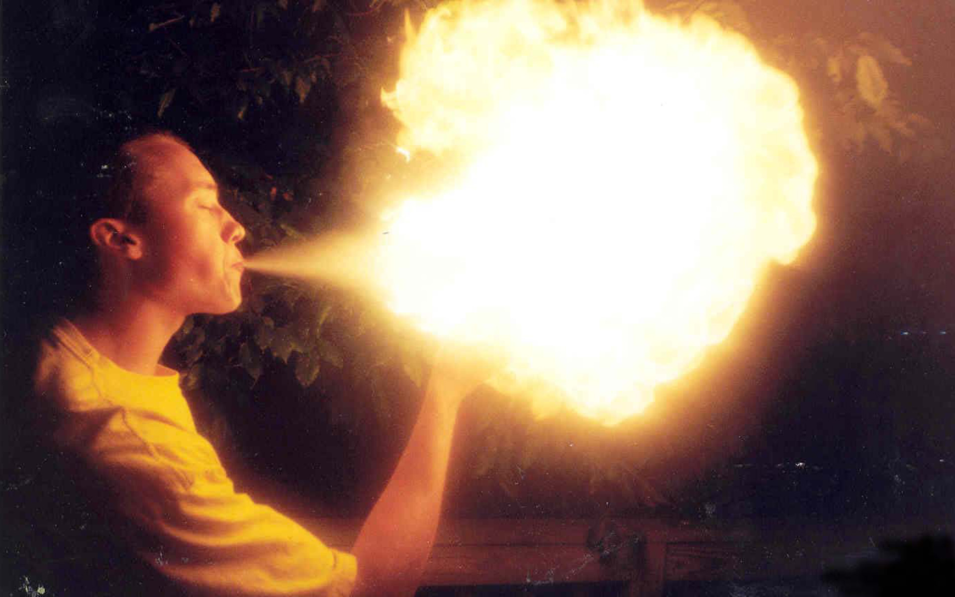 Photo of me blowing fire in college.